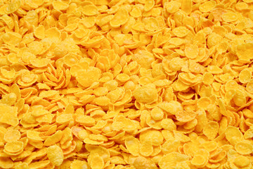 Corn-flakes background and texture. Top view. cornflake cereal box for morning breakfast.