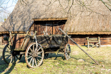 Fototapeta na wymiar A wooden cart, a cart under a horse harness.