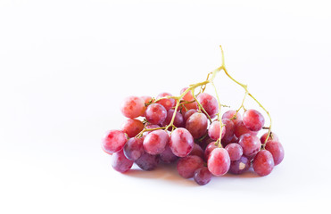 red grapes isolated on white background. selective focus.