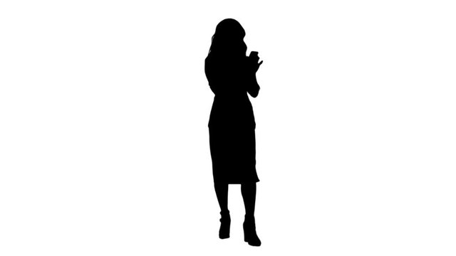 Silhouette Asian businesswoman using mobile phone track matte