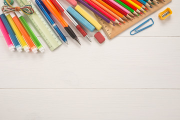Obraz premium School office supplies on a wooden background