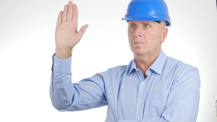 Businessman wearing Engineer Helmet Salute with a Hand Gestures