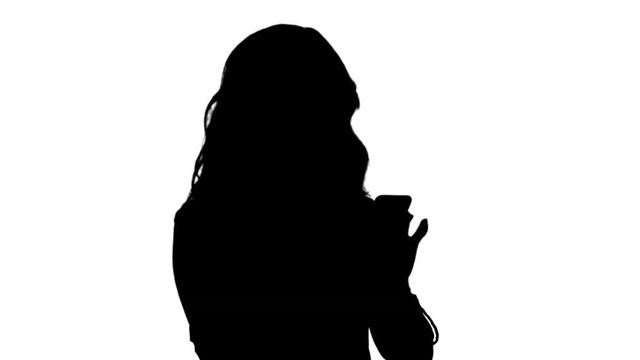 Silhouette Businesswoman using of mobile phone track matte