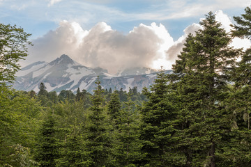 Tops of the Caucasus Mountains in clouds