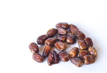 dried dates isolated on white background. selective focus.