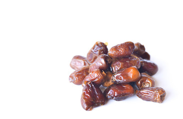 dried dates isolated on white background. selective focus.