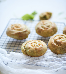 Homemade baking. Buns with spinach and garlic