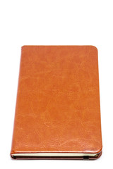 Classic leather notebook close up isolated.