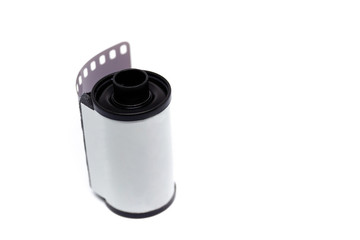 135 negative black and white film roll close up, isolated on white background.