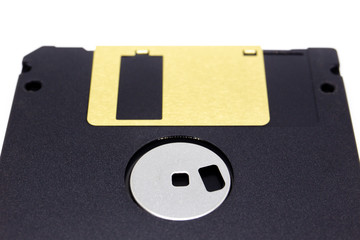 Photograph of the floppy disk close up isolated on white background.