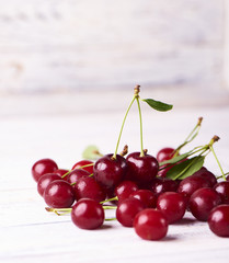 Close-up view of fresh ripe cherry on white