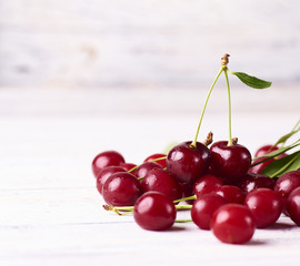 Close-up view of fresh ripe cherry on white