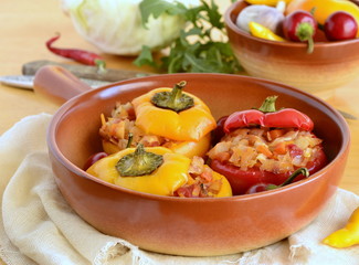 Baked sweet peppers stuffed with vegetables, vegetarian meal