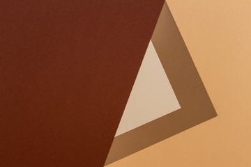 Color papers geometry composition background with beige and brown trendy color tones