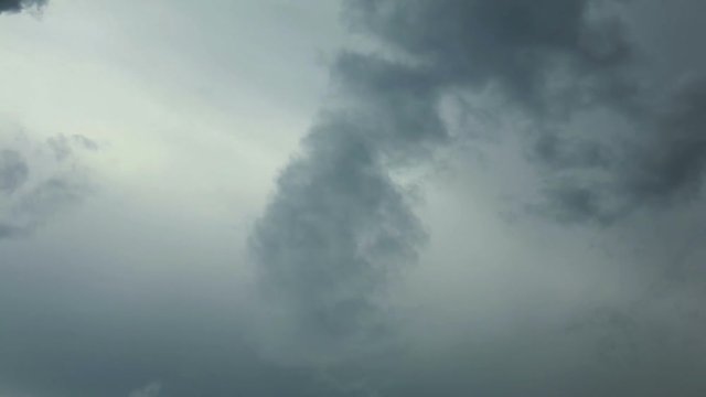 Fast moving clouds, White clouds running over blue sky. Time Lapse, Storm clouds lift, reveal bright white fluffy mass forming in blue sky.