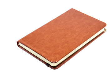 Classic leather notebook close up isolated.
