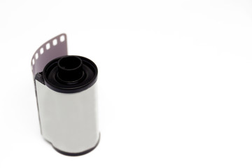 135 negative black and white film roll close up, isolated on white background.