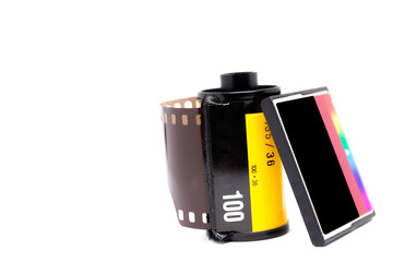 Photograph of 135 negative films and the modern memory card (CF Card) isolated on white background.