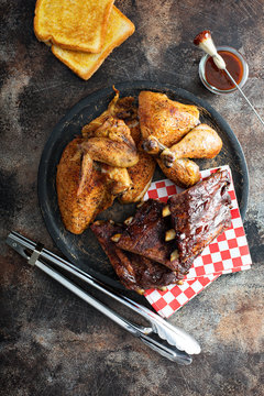 Grilled or smoked ribs and chicken