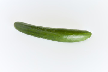 fresh green cucumbers isolated on white background.