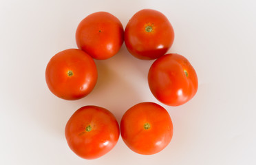 ripen tomatoes isolated on white background. selective focus.