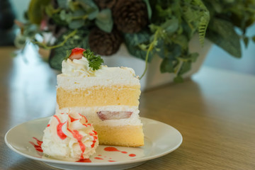 strawberry cake on white plate