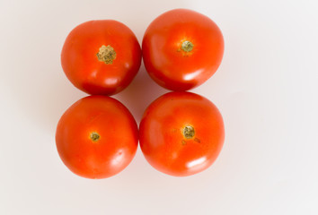 ripen tomatoes isolated on white background. selective focus.