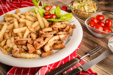 Greek gyros dis with fries and salad