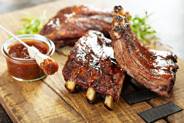 Grilled and smoked ribs with barbeque sauce - obrazy, fototapety, plakaty