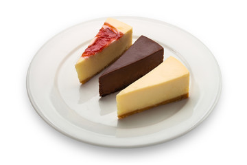 Three cheesecakes, isolated on white background