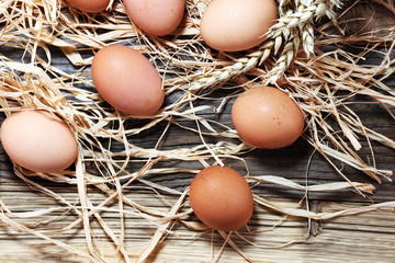 Egg. Fresh farm eggs on a wooden rustic background