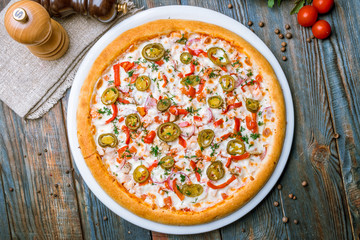 Spicy pizza with vegetables and jalapeno