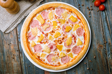 pizza Hawaiian with pineapple and ham