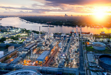 Fototapeta na wymiar Aerial view of twilight of oil refinery ,Shot from drone of Oil refinery plant ,refinery Petrochemical plant at dusk , Bangkok, Thailand
