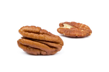 Fresh pecan nuts isolated on a white background