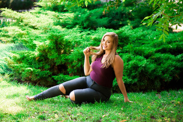 Young beautiful plus size model outdoors, xxl woman on nature.