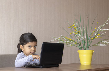 Cute little girl playing at the office