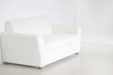 Fototapeta na wymiar White sofa on white empty floor background