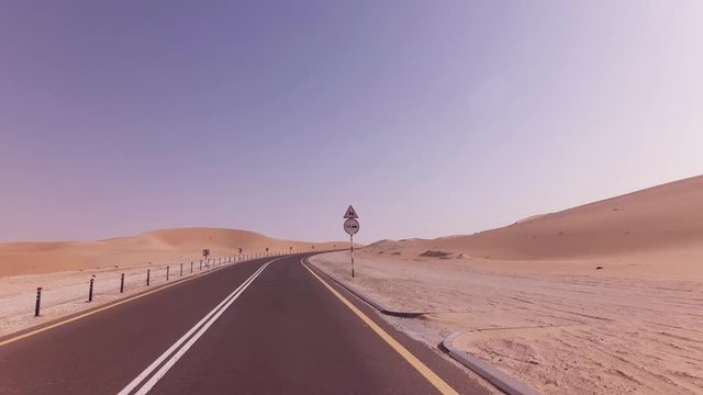 New road from Oasis Liwa to Moreeb Dune in Rub al Khali desert stock footage video