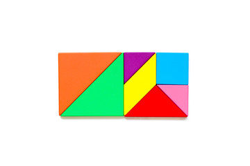 Color wood tangram puzzle in rectangle shape on white background
