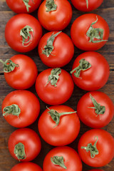 red tomatoes as background