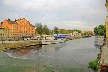 Beautiful view on Uppsala from river side on beautiful summer day. Beautiful landscape backgrounds. Tourism / travel concept. Sweden, Europe.