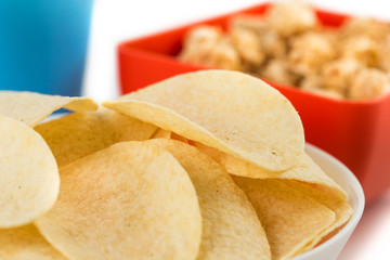 Close-up potato chips, isolated on white background