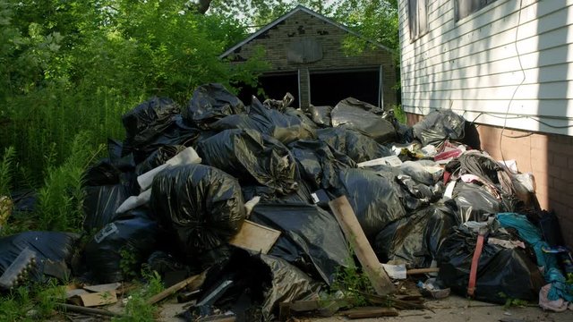 Abandoned House And Heap Of Garbage In Ghetto