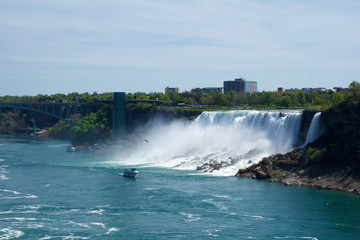 NIAGARA FALLS, ONTARIO, CANADA - MAY 20th 2018: View of the American Falls is the second-largest of the three waterfalls that together are known as Niagara Falls on the Niagara River along the Canada