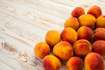 fresh peaches in a plate on the table