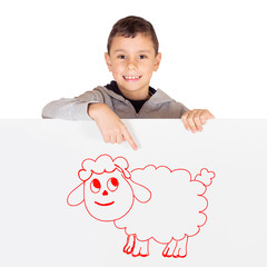 Young boy showing white board with drawing of sheep - celebrating Eid ul Adha - Happy Feast