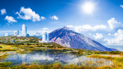 Telescopes of the Izana astronomical observatory on Teide park and Teide Volcano, Tenerife, Canary Islands, Spain - obrazy, fototapety, plakaty