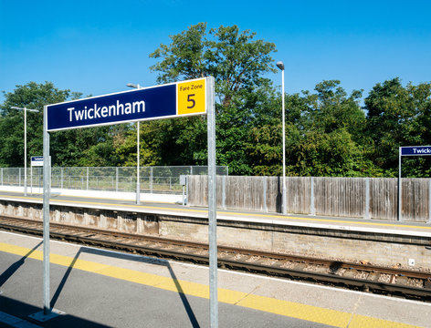 Twickenham signage at the central railway station in the suburb of London with emtpy platform