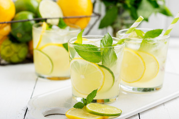Lemonade. Drink with fresh lemon and lime. Cocktail with juice and ice.